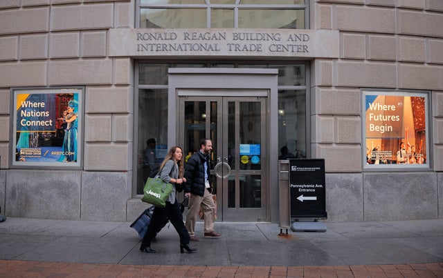 Former USAID employees collect their belongings after the agency was dismantled by the Trump administration at USAID headquarters on Feb. 27, 2025, in Washington, D.C. 