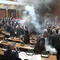 Lawmakers injured as smoke bombs, flares thrown in Serbian parliament