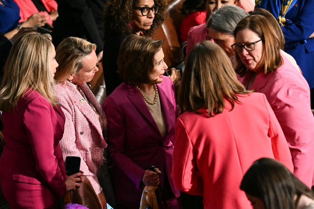 Rep. Nancy Pelosi, a Democrat from California, gathers with other female lawmakers wearing pink ahead of President Trump's address to a joint session of Congress in the House chamber of the U.S. Capitol in Washington, D.C., on March 4, 2025. 