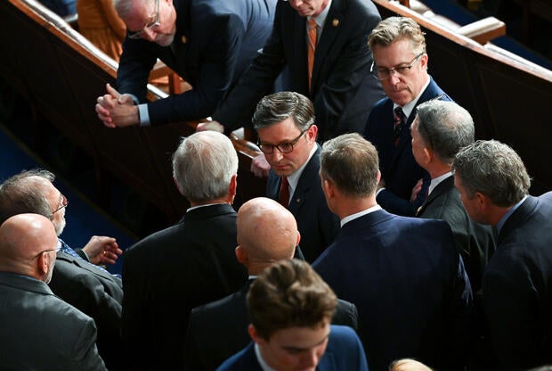 Speaker Mike Johnson speaks with House Republicans, including several members of the House Freedom Caucus, during the first round of speaker votes on the opening day of 119th Congress at the U.S. Capitol on January 3, 2025 in Washington, D.C.