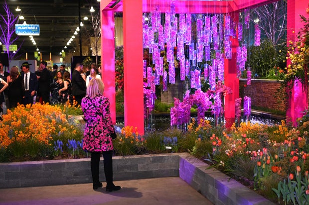 People pose for a photo at the Philadelphia Flower Show Preview Party