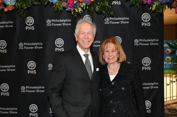 People pose for a photo at the Philadelphia Flower Show Preview Party
