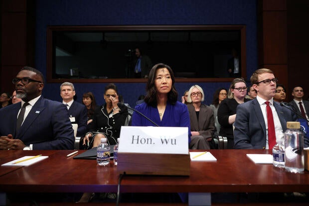 Chicago Mayor Brandon Johnson, Boston Mayor Michelle Wu, and Cato Institute immigration expert David J. Bier look on before a House Oversight Committee hearing on sanctuary cities at the U.S. Capitol in Washington, D.C., on March 5, 2025. 