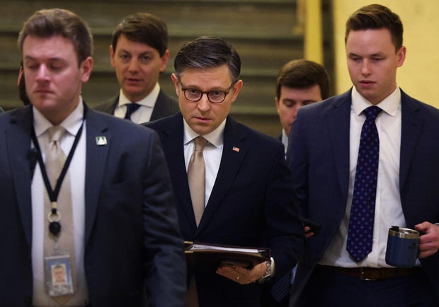 Speaker of the House Mike Johnson arrives for a House Republican Conference meeting at the U.S. Capitol in Washington, D.C., on March 11, 2025.