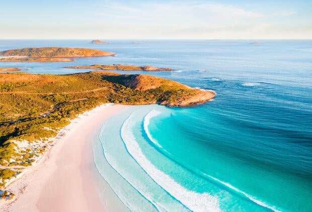 Surfer attacked by shark off coast of Australia is presumed dead, as police say drone footage captured aftermath