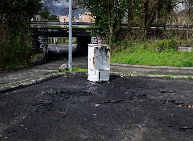 The site where a burnt stolen car was found that was used to chase former local gangster Jean-Pierre Maldera, who was killed in an attack on the nearby A41 highway, is seen in Grenoble, France, March 12, 2025.