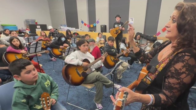 Guitars Not Guns volunteer Barbara Gorin