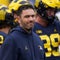 Former Michigan coach charged with identity theft and computer hacking