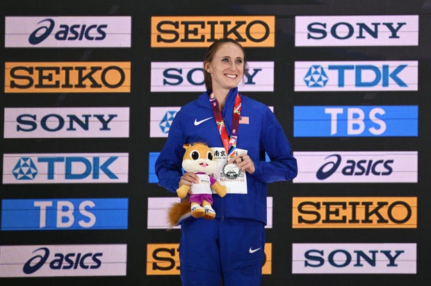 Silver medalist Shelby Houlihan of Team United States poses on the podium during the medal ceremony after the Women's 3000m Final on day two of the World Athletics Indoor Championships Nanjing 2025