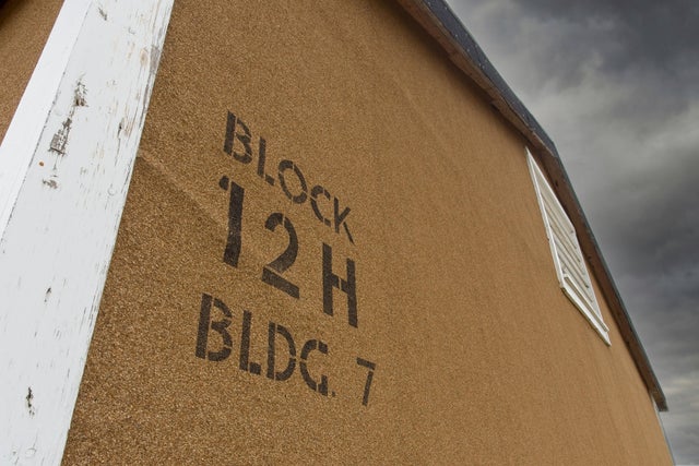 Storm clouds gather along prison block at the Granada Internment camp 