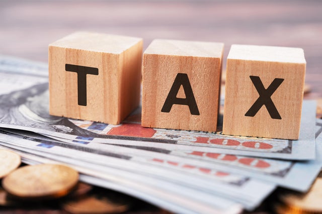 Tax Text on Wood Block 