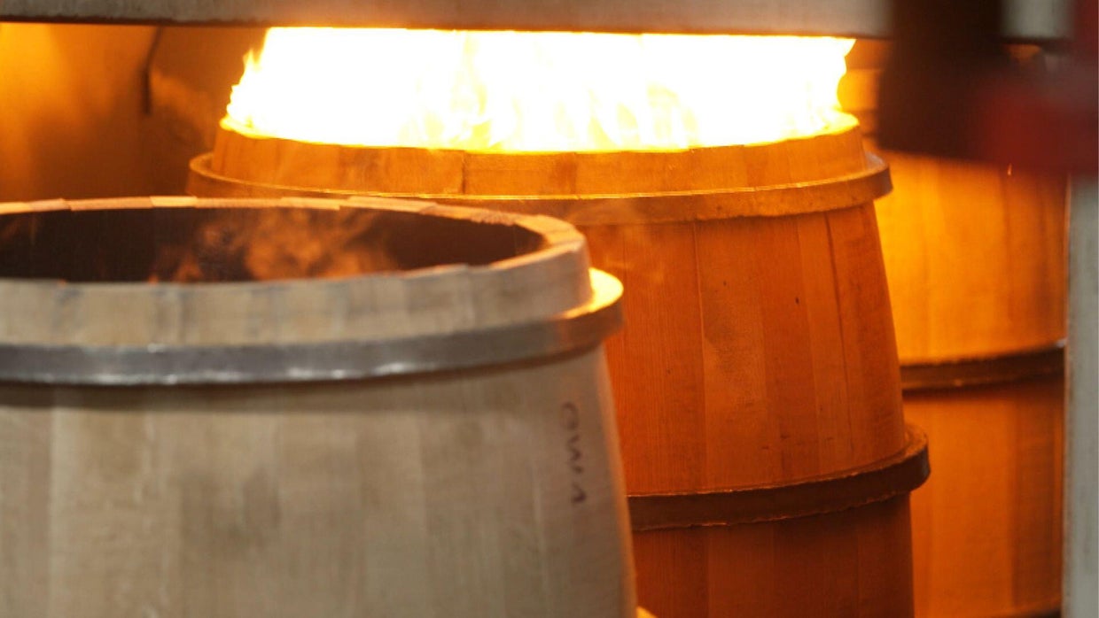 Barrels go through a char oven 
