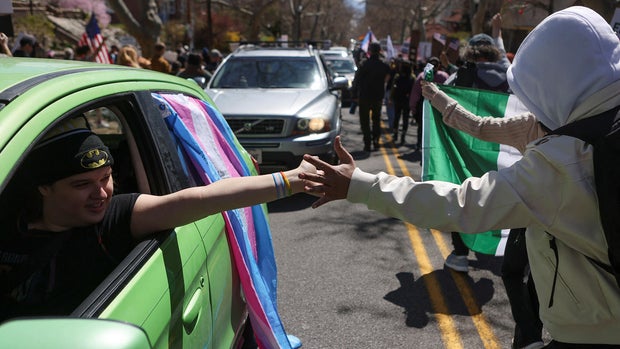 People participate in a protest, in a demonstration that is part of larger "Hands off" events organized nationwide against U.S. President Trump, in Salt Lake City 