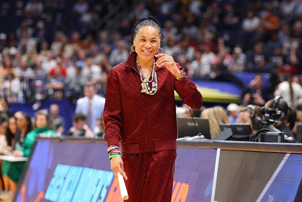 Dawn Staley smiles during the Final Four game between Texas Longhorns and South Carolina Gamecocks on April 4, 2025 