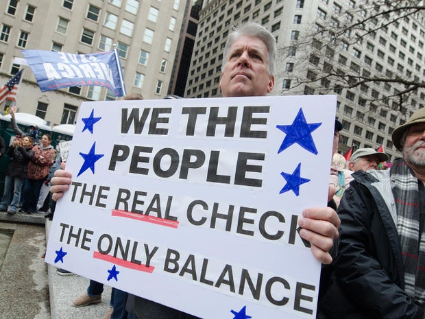 'Hands Off!' protesters rally against Trump in Chicago 