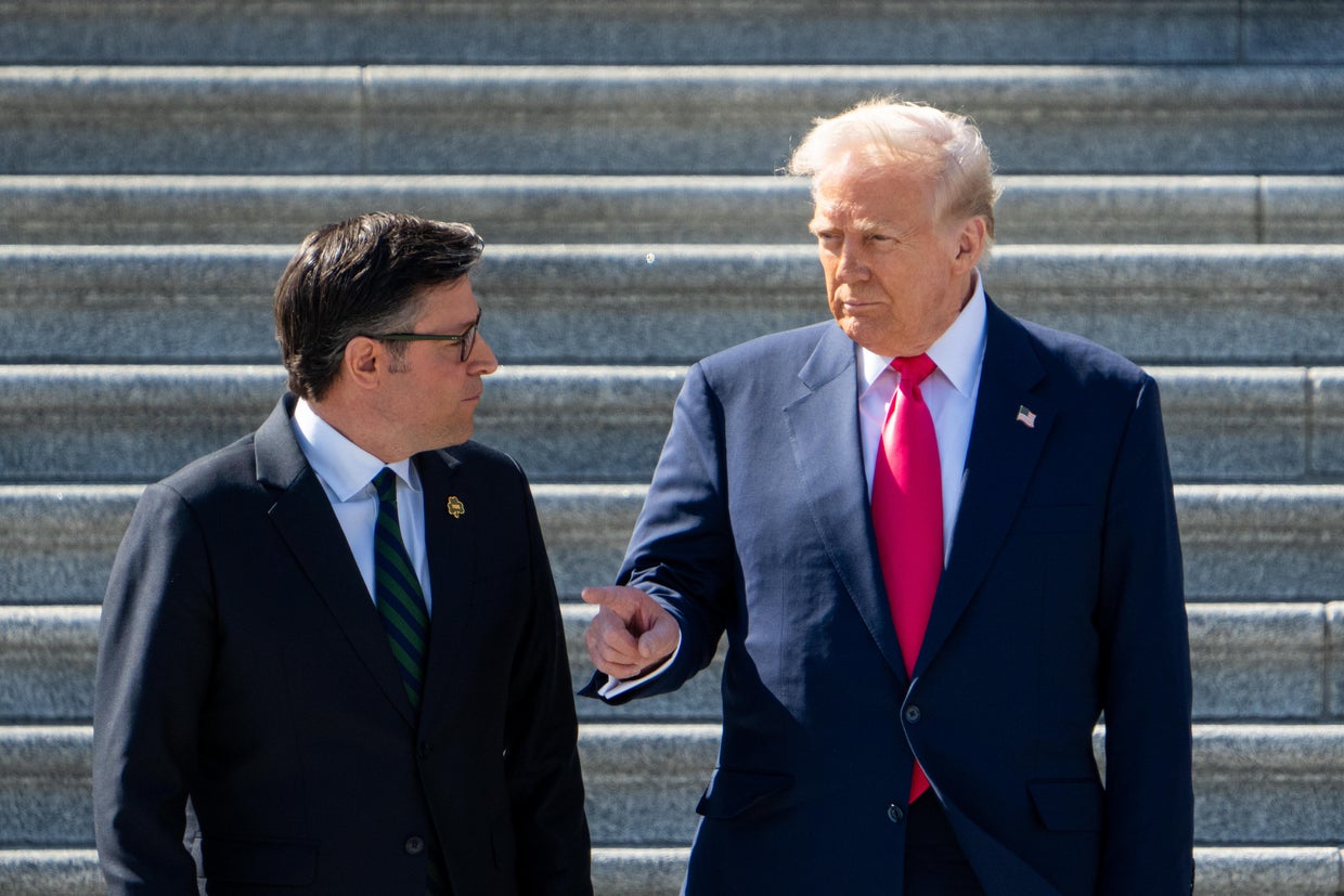 Speaker of the House Mike Johnson, left, speaks with President Trump on the House steps following the annual Friends of Ireland luncheon in the U.S. Capitol on Wednesday, March 12, 2025.