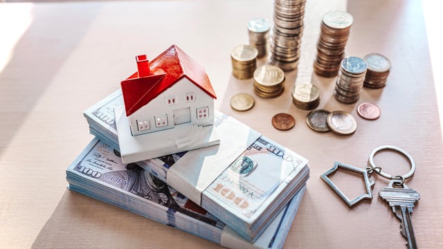 Home concept, Home savings, Selling home, Money and house, Business and finance concept 