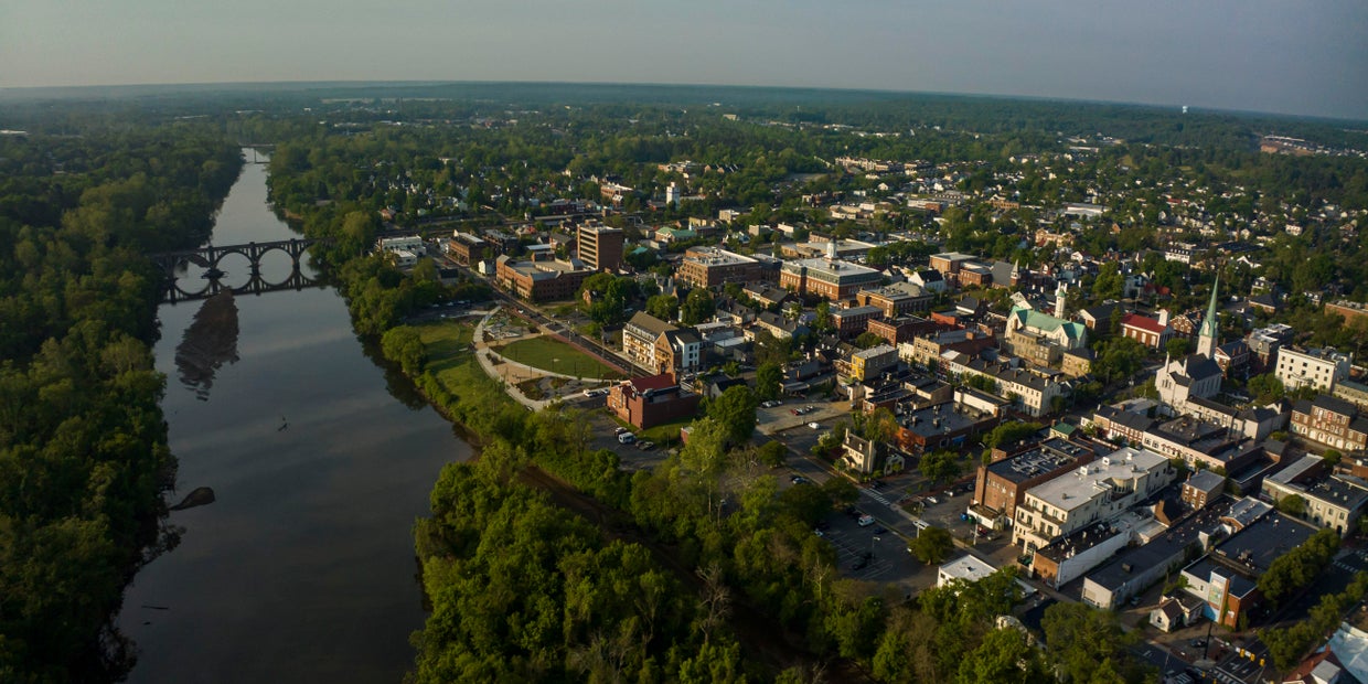 Aerial view of Fredericksburg, Virginia on Rappahannock River at sunset after storm with rainbow