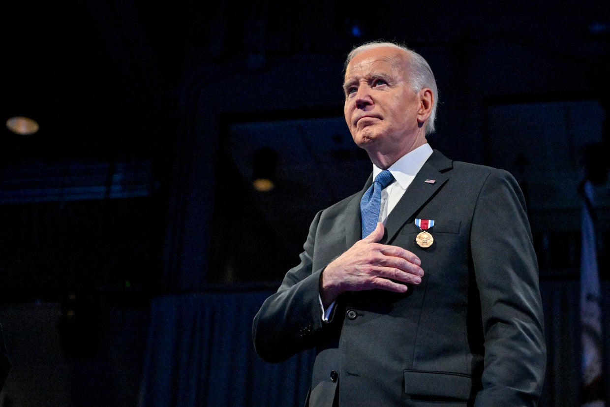 President Joe Biden reacts to applause after he received a medal and spoke at a Department of Defense Commander in Chief Farewell Ceremony at Joint Base Myers-Henderson Hall in Arlington, Virginia, on January 16, 2025.