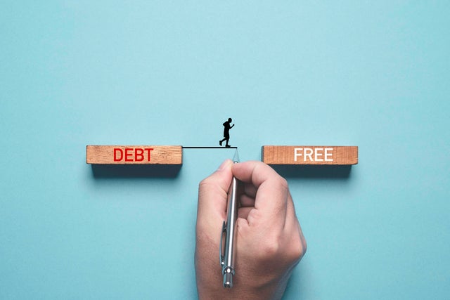 Hand writing line to connect between deb and free wording for solving business consumer burden financial debt or borrow mortgage failure crisis concept. 