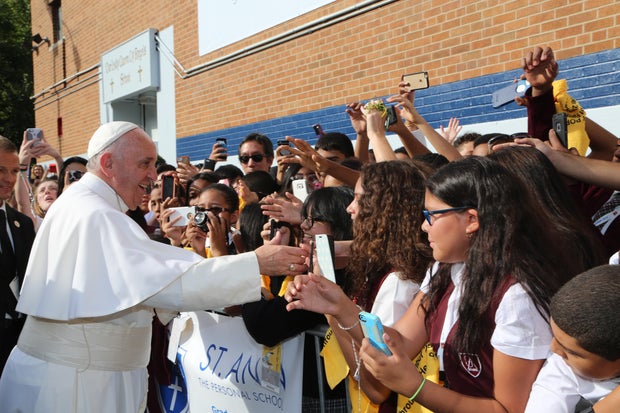 Pope Francis greets Catholic School Students in Harlem during his Apostolic Visit to New York City, New York on September 25, 2015. 