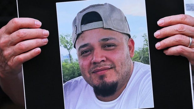 A protester holds a photo of Kilmar Abrego Garcia on April 24, 2025, in New York City. 