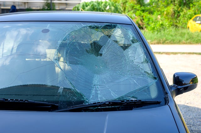 Broken car windshield in car accident. 