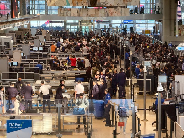 People line up to enter Transportation Security Administration checkpoints in Los Angeles International Airport in California on Jan. 6, 2025. 