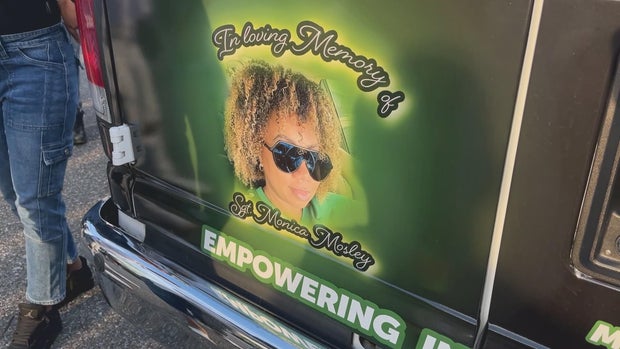 A photo of Sergeant Monica Mosley on the back of the van 