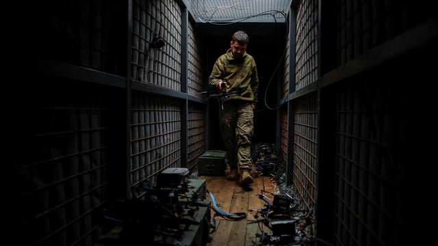 Ukrainian service members prepare FPV drones during the unilaterally proposed three-day ceasefire declared by Russia, near a frontline in Dnipropetrovsk region 