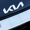 Kia logo on a car of the brand 