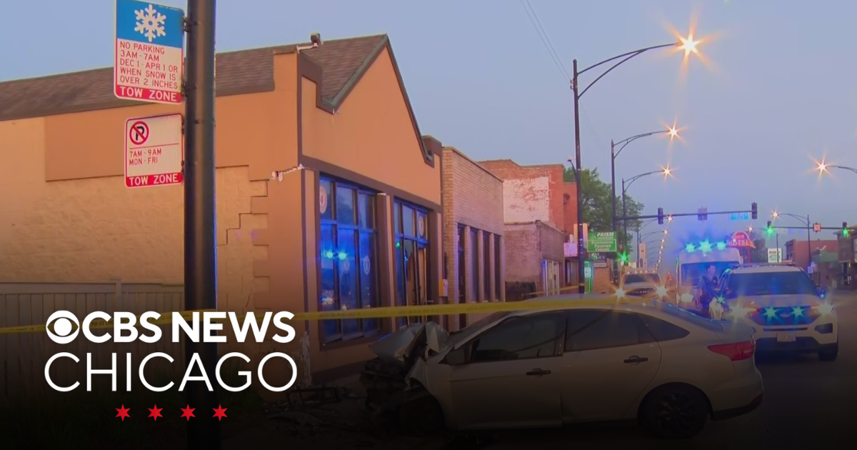 Car crashes into building while avoiding scooter riders in Garfield ...