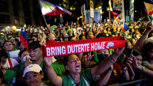 FILE PHOTO: In custody in the Hague, on ballot at home: Duterte's grip on Philippines endures 