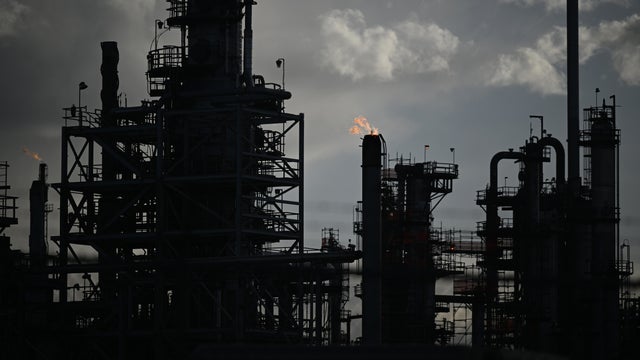 Community members and environmental advocacy groups gather to discuss their concerns with Suncor refinery 