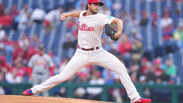 Aaron Nola winds up to throw a pitch at Citizens Bank Park during a game against the Cardinals 