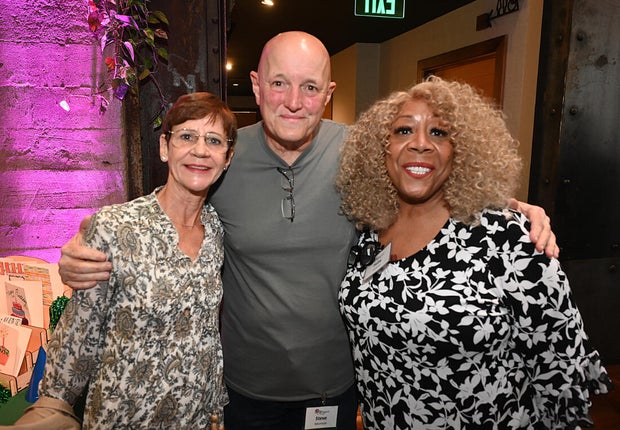 People pose for a photo at the Philabundance event 