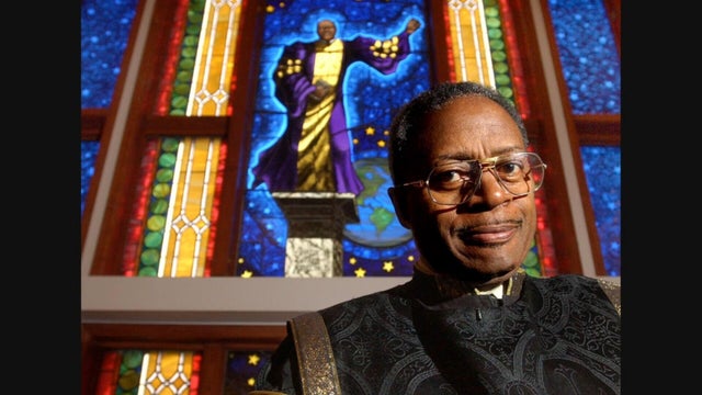 rev-peters-in-front-of-stained-glass-of-mlk-jpg-new-01-frame-0.jpg 