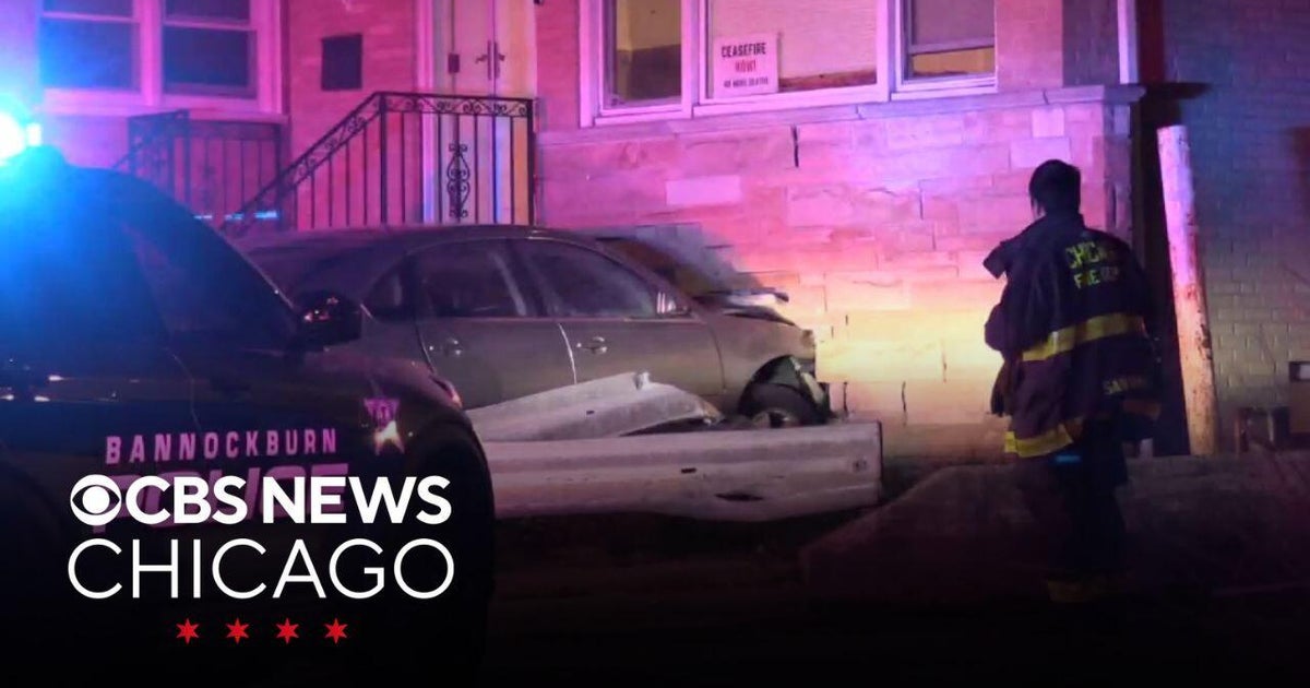 At least 1 in custody after car crashes into Chicago home after police ...