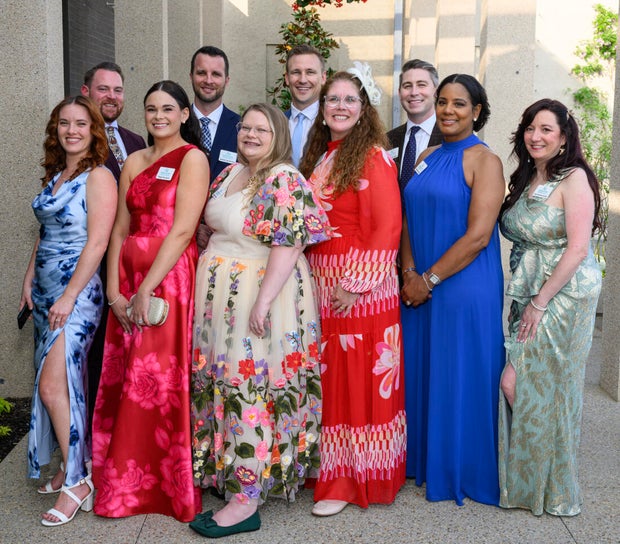 People pose for a photo at a gala for Nemours 