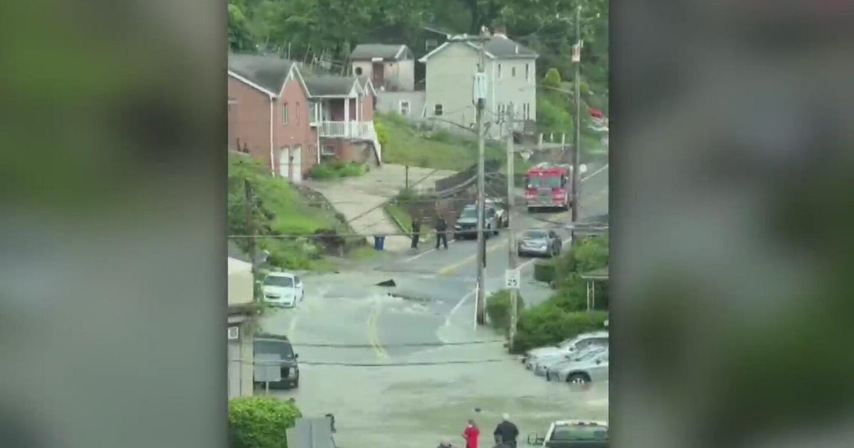 Large water main break floods street in Pittsburgh's Banksville Road ...