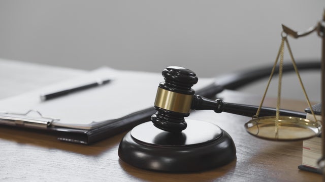 Close up Mallet of the judge at law firm of courtroom. 