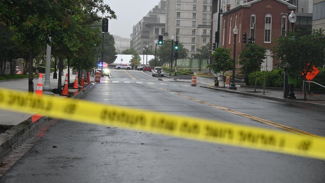 FBI agents and police work the crime scene during daylight hours where two Israeli Embassy employees were killed as they were outside an event at the Capital Jewish Museum in Washington, D.C., May 22, 2025. 