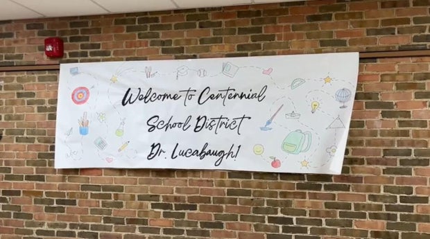 A sign hanging in the school says, Welcome to Centennial School District Dr. Lucabaugh! 