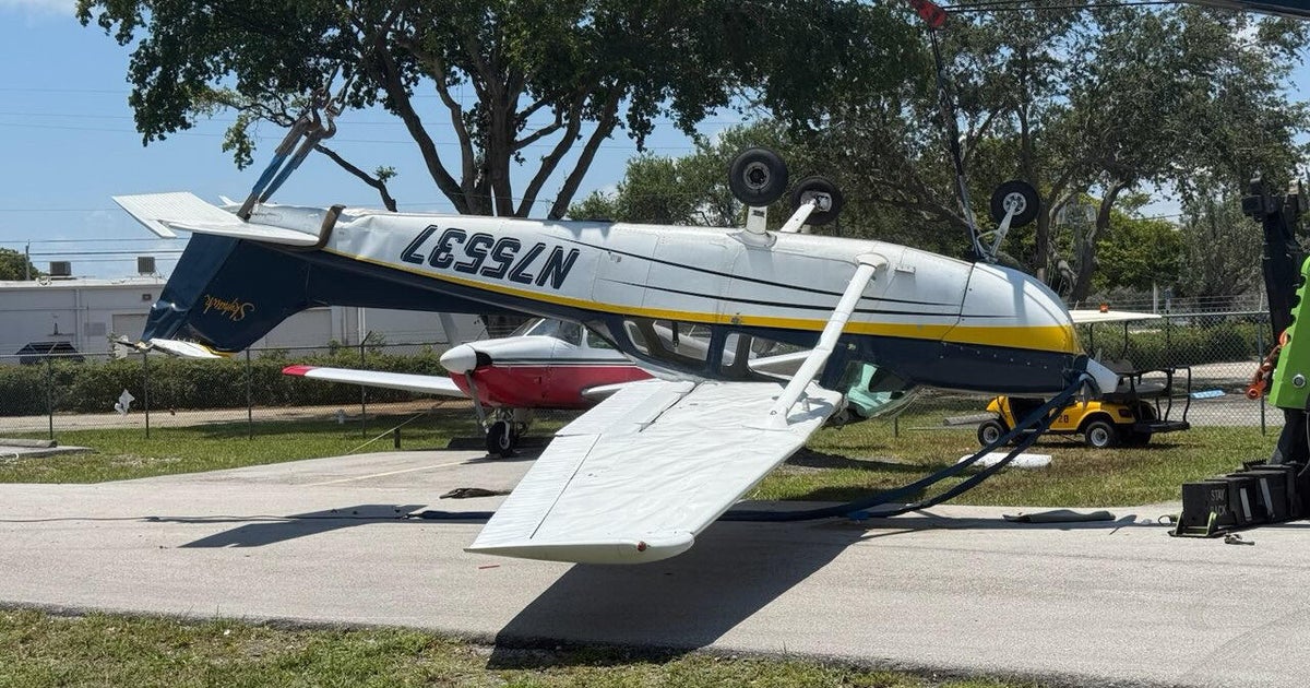 Storm-toppled plane crushes worker during towing attempt at Fort Lauderdale airport Storm-toppled plane crushes worker during towing attempt at Fort Lauderdale airport