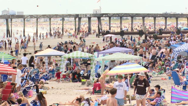 Beachgoers pack the sand in Ocean City, New Jersey 