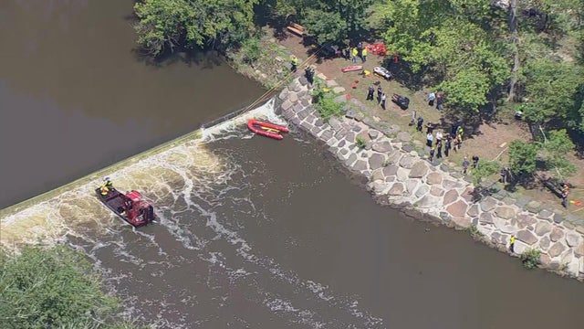 Overhead shot of rescue boats in Neshaminy Creek in Tyler State Park in Pennsylvania 