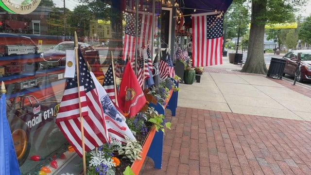 Flags are seen outside a South Jersey store for Memorial Day 