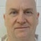 Arkansas town on edge after ex-police chief convicted of murder escapes prison