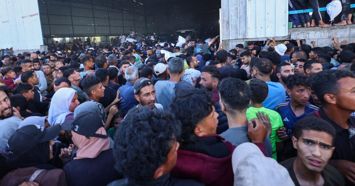 Multiple Palestinians died as hundreds rush for food in Gaza, health officials say