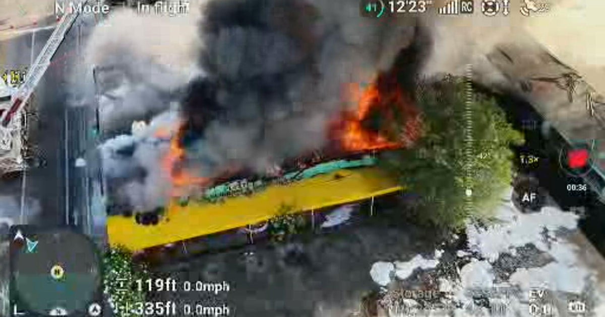 Abandoned warehouse bursts into massive fire in Miami, officials say